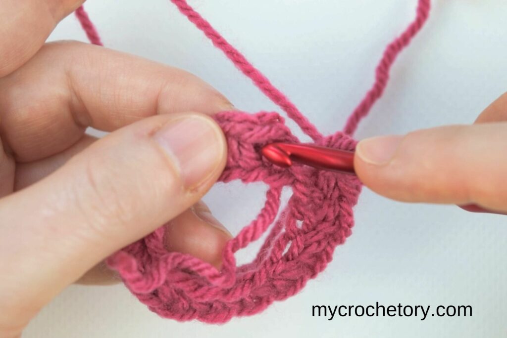 Close-up of the continuous spiral technique in the crochet waistcoat stitch tutorial.