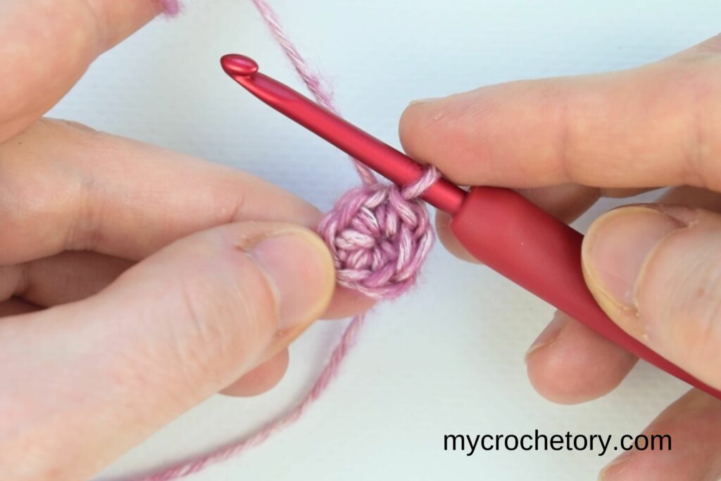 Step-by-step photo of how to crochet a circle starting with a magic ring and single crochet stitches.