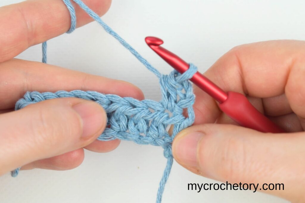 Placing the first half double crochet stitch directly below the turning chain—how to crochet straight edges