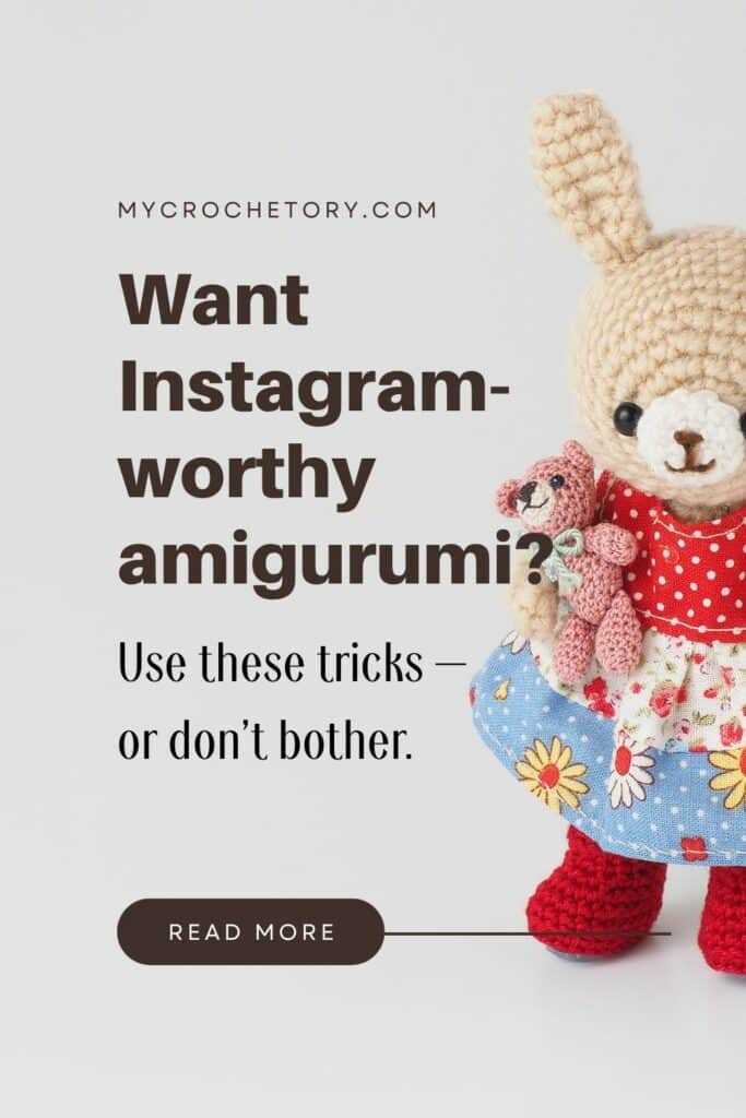 Finished bunny plushie in a floral dress holding two tiny bears — an example of easy crochet amigurumi tricks for clean shaping and cuteness.