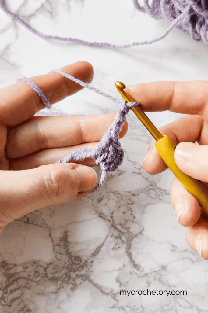 Adding the chain 2 center space in a top down crochet shawl