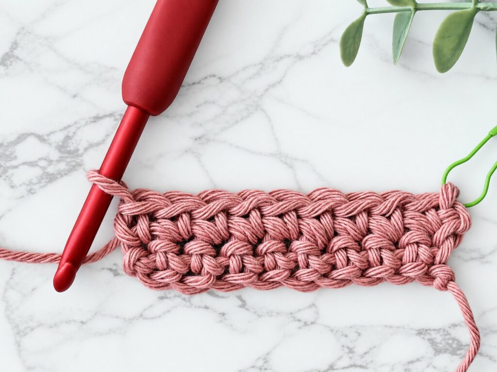 Row 2 of single crochet finished, with the turning chain on the side