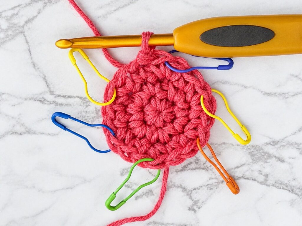 Flat crochet circle round 3 with 18 stitches